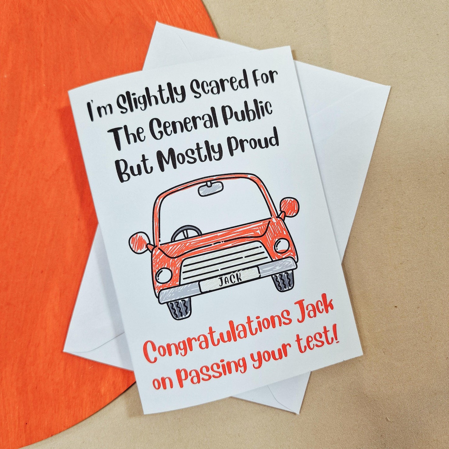 Personalised congratulations card for passing a driving test, featuring a funny message and a car illustration with a custom name on the number plate. A humorous and celebratory card with the option for a custom message inside, perfect for new drivers