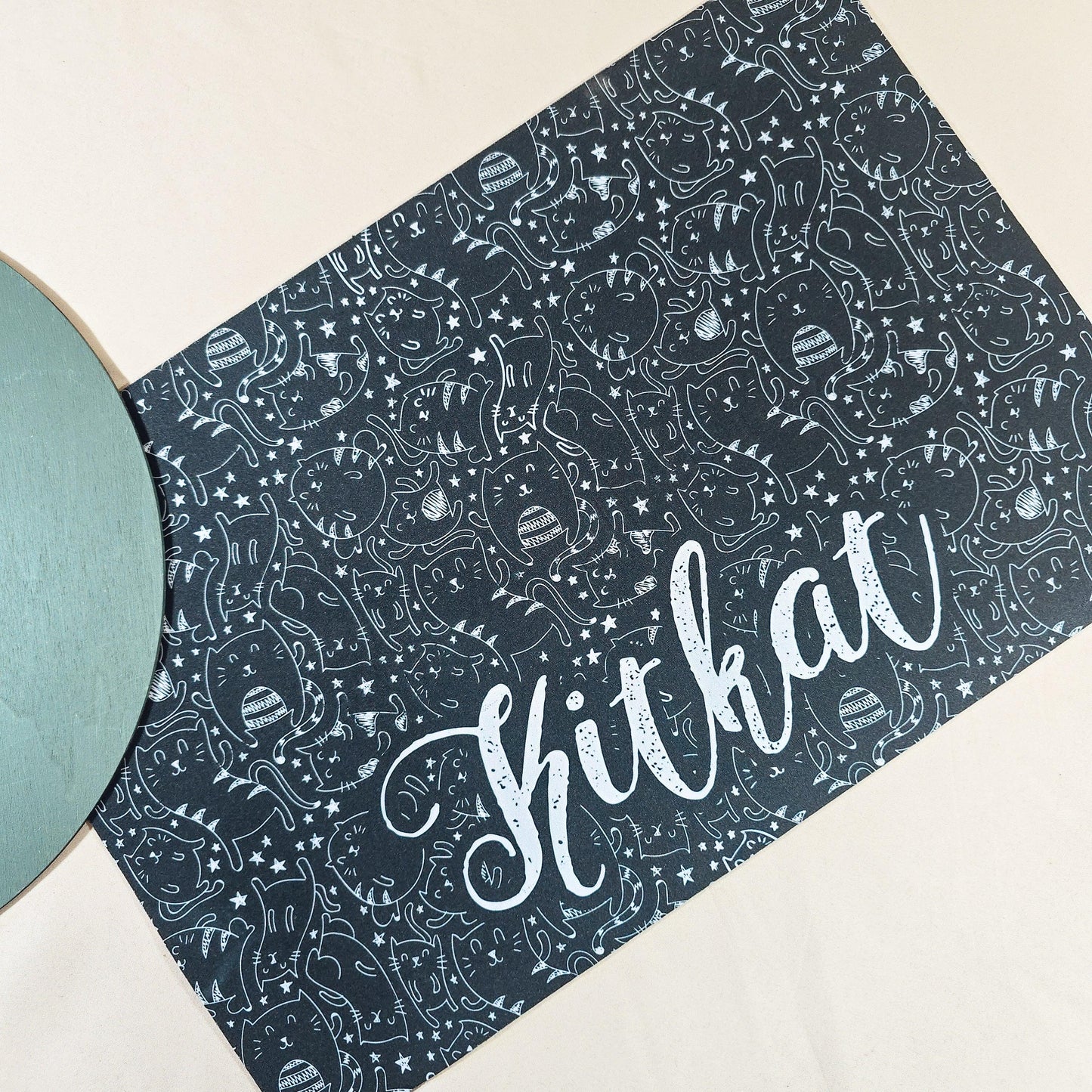 Personalised cat pet mat featuring various cat drawings with the cat's name printed in the center. Ideal for a cat's feeding or resting area.