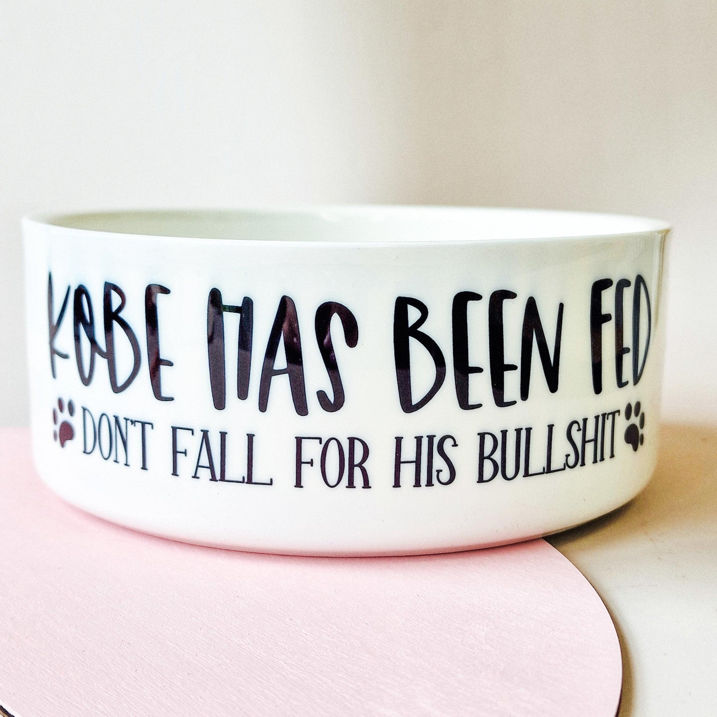 Pet bowl with the message "Name Has Been Fed, Don’t Fall for His Bullshit," personalised with the pet’s name, available in small, medium, and large sizes, ideal for dogs and cats.