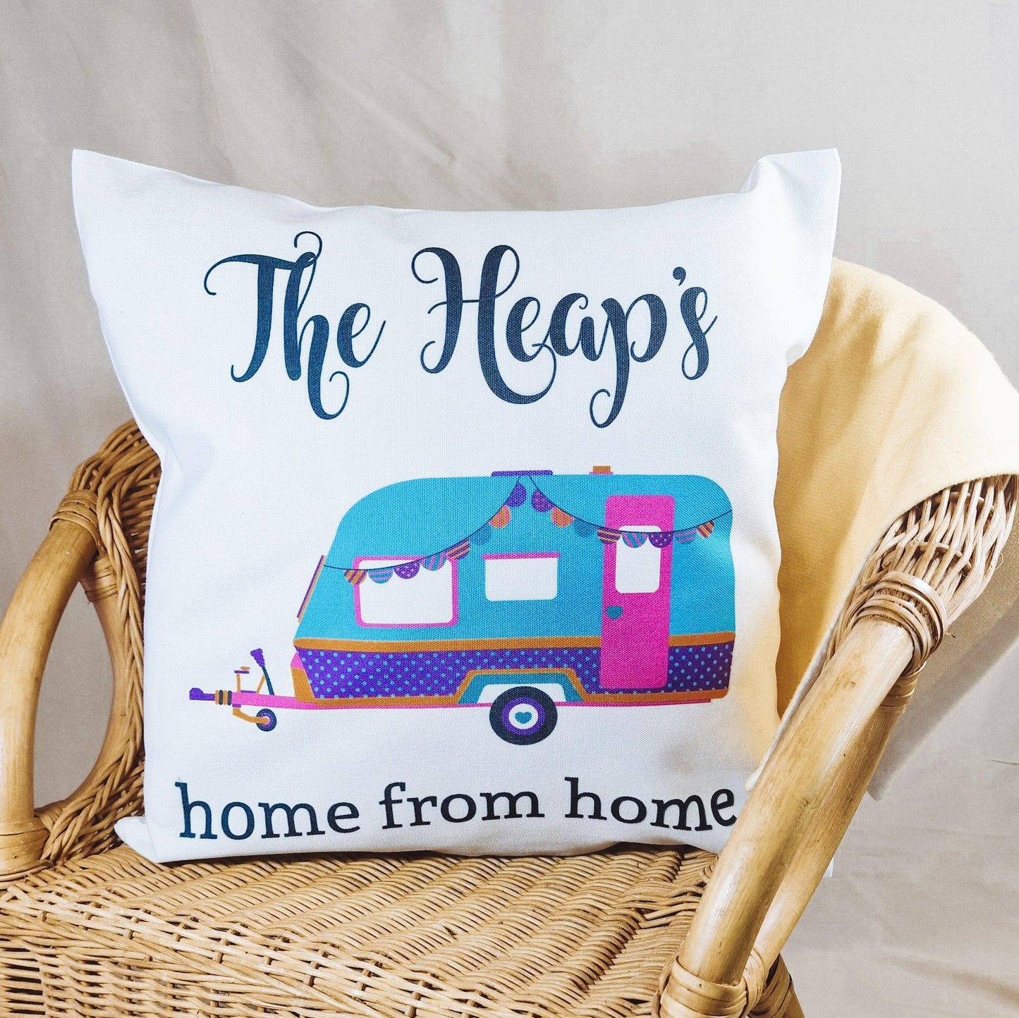 40x40cm cushion cover featuring a caravan design with "Home from Home" and a family name, ideal for adding a personal touch to home décor.