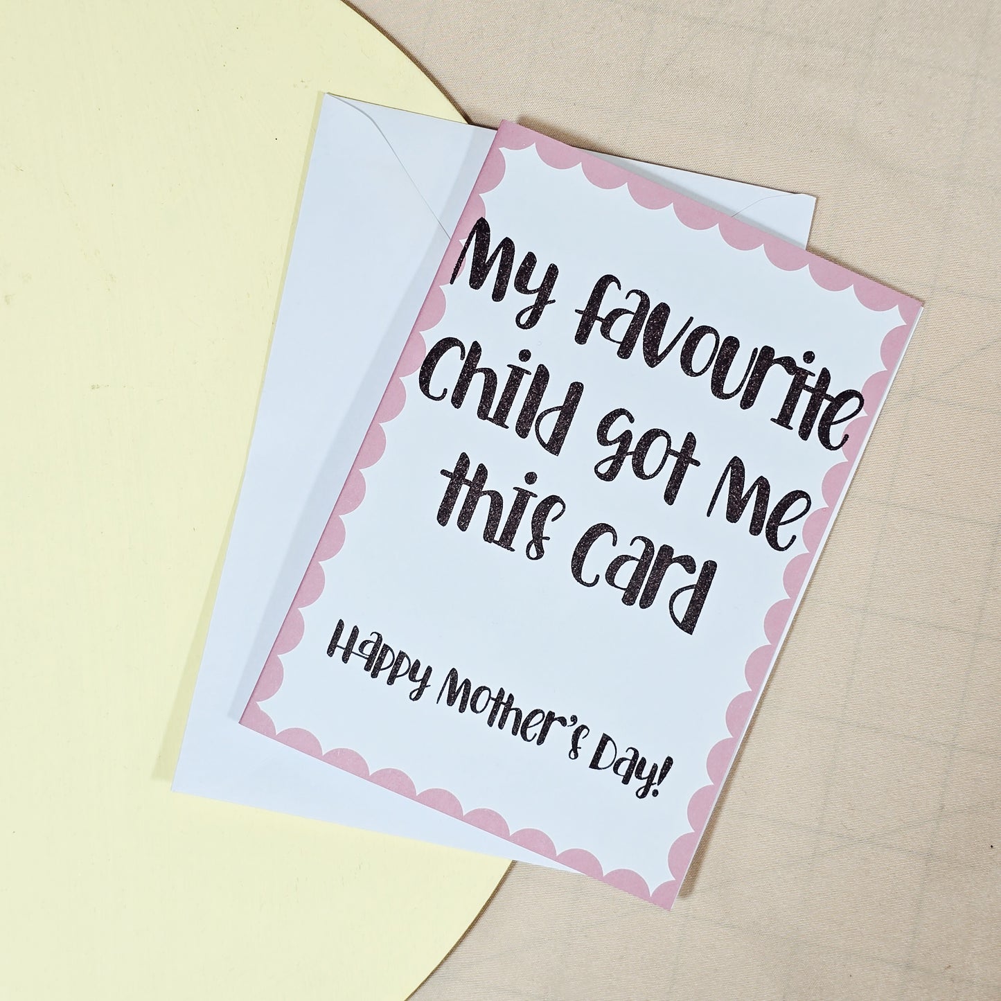 A6 Mother’s Day card with the text “My Favourite Child Got Me This Card. Happy Mother’s Day” in a playful font. Comes with a white envelope.