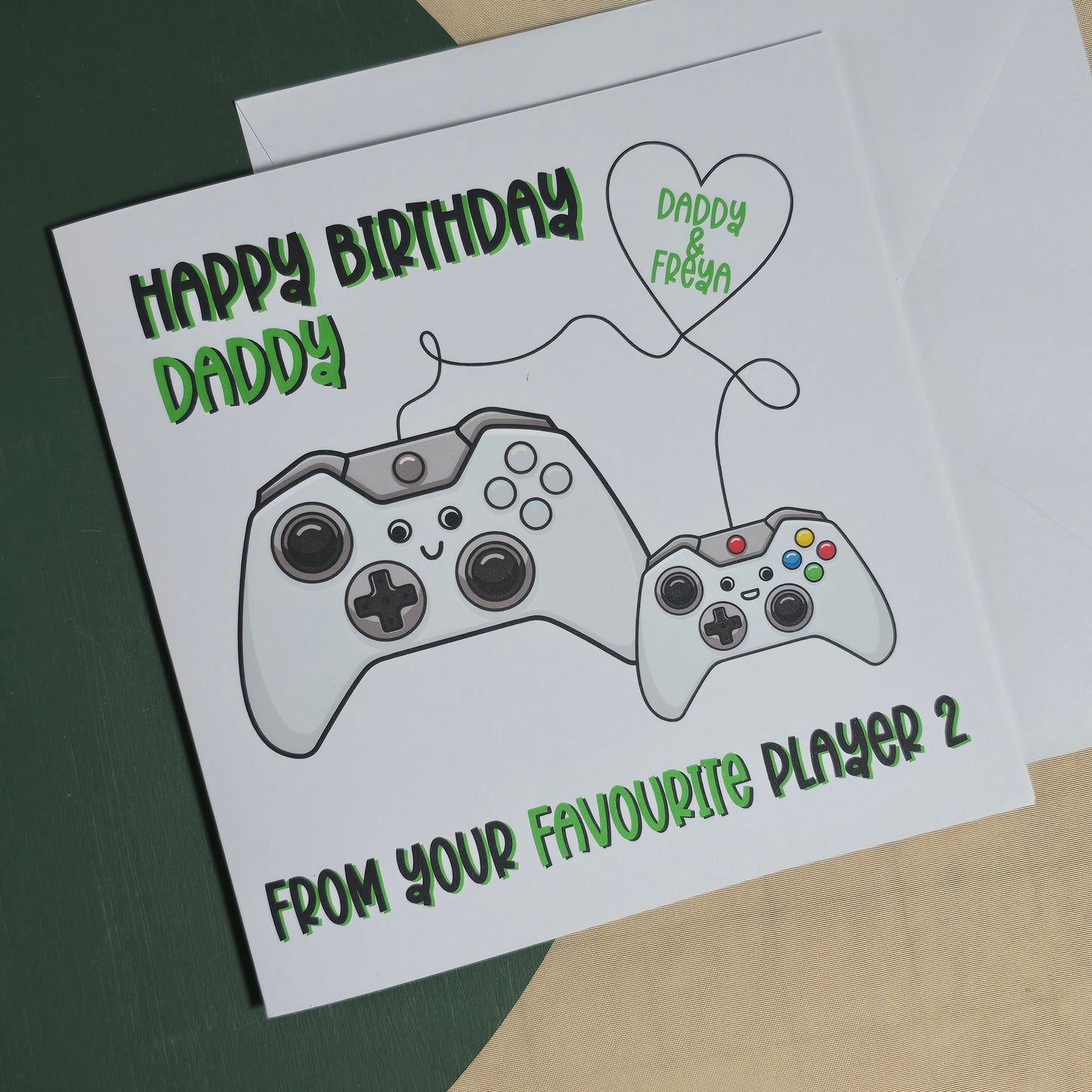 Birthday card for a father with gaming controllers and text on a white background