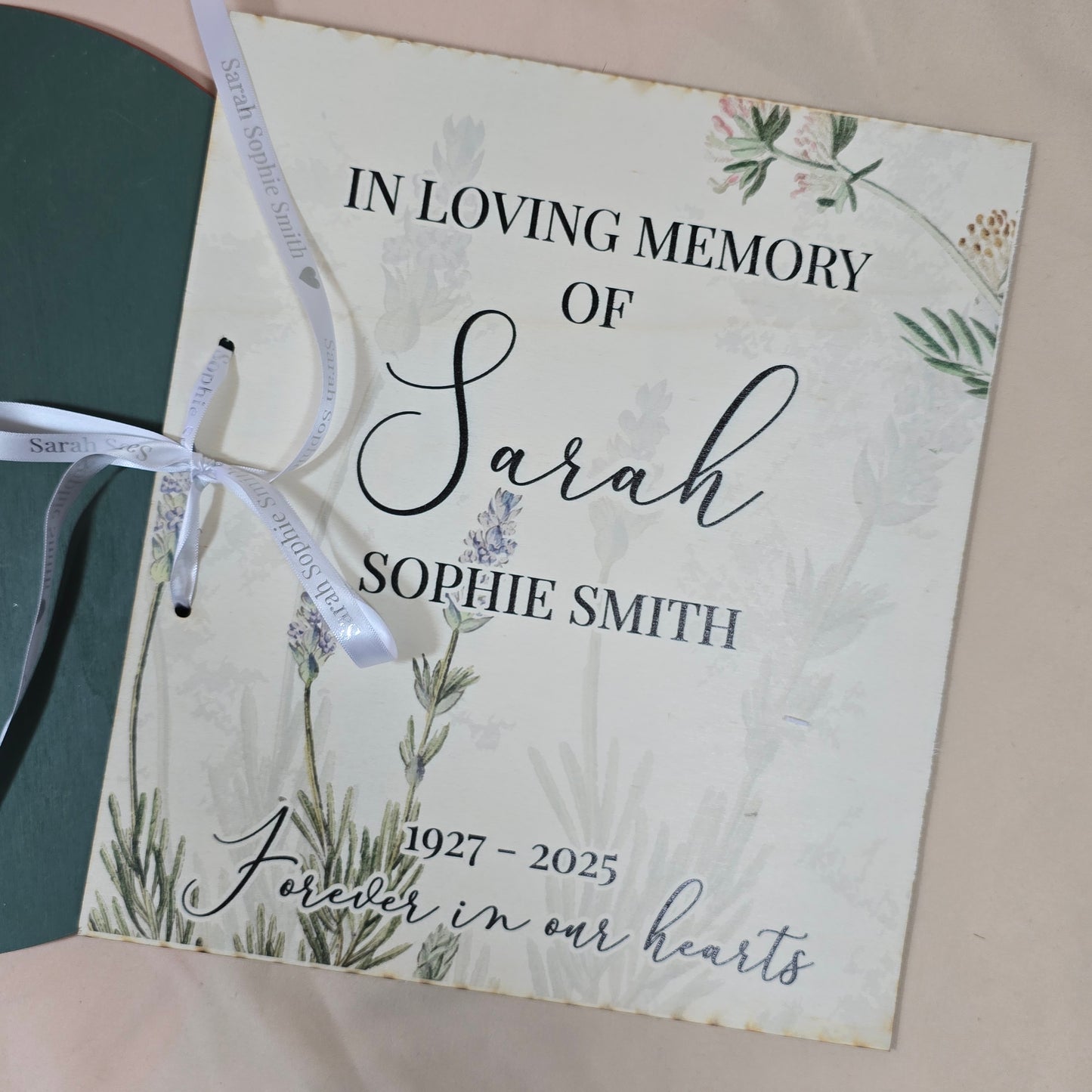 Memorial card for Sarah Sophie Smith with floral design and ribbon