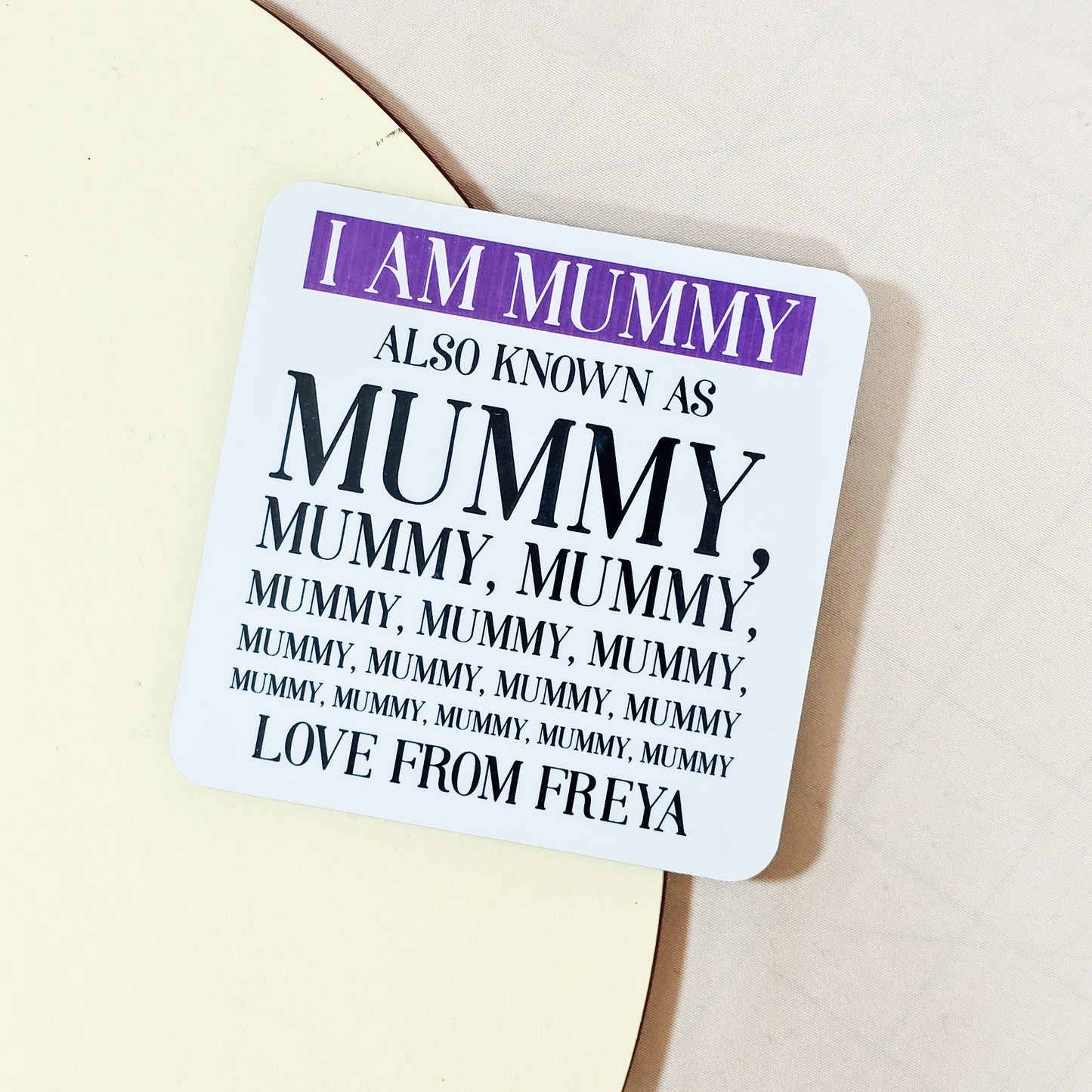 Funny personalised "I am mummy" coaster with repeated text and child's name.