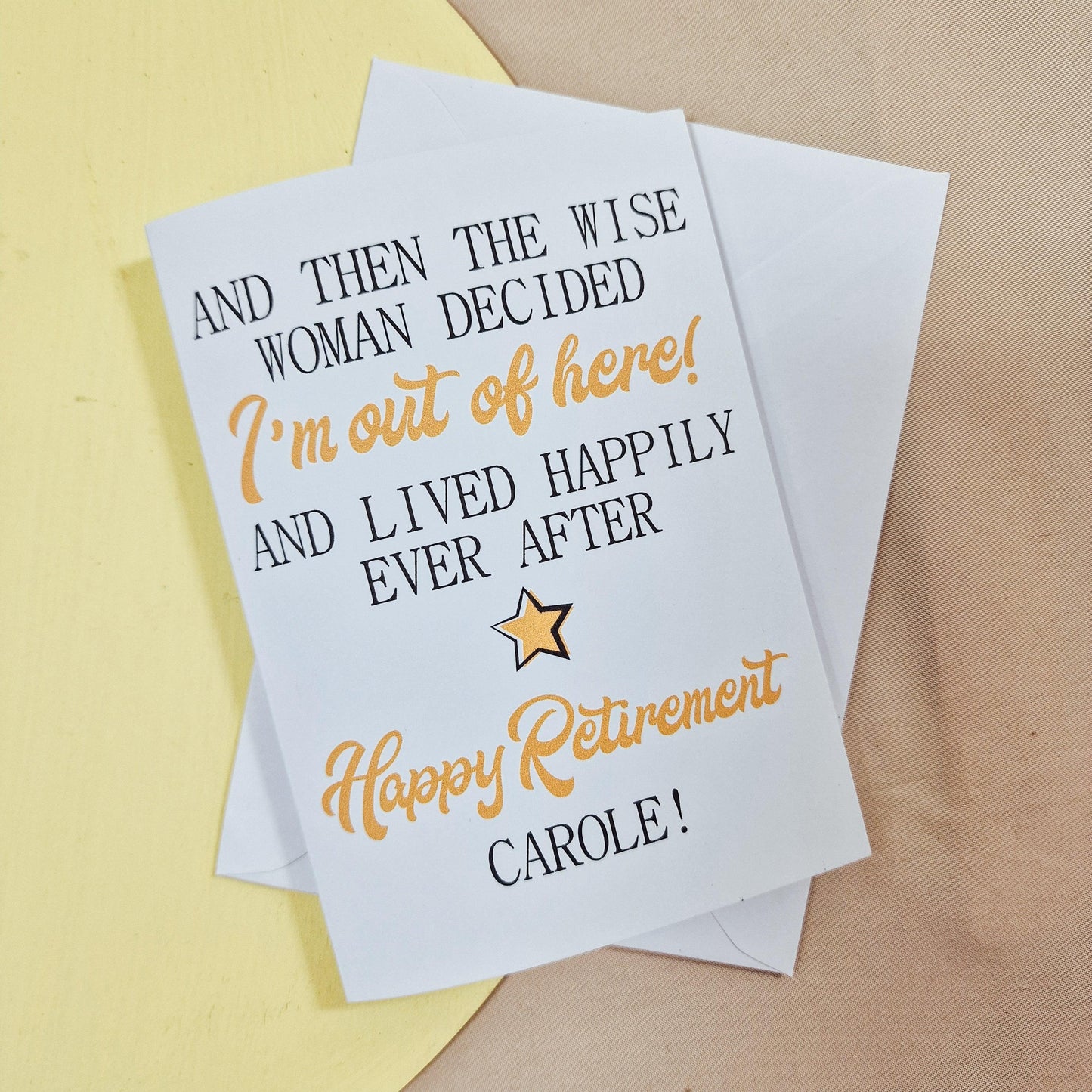 a white card printed with a retirement quote on