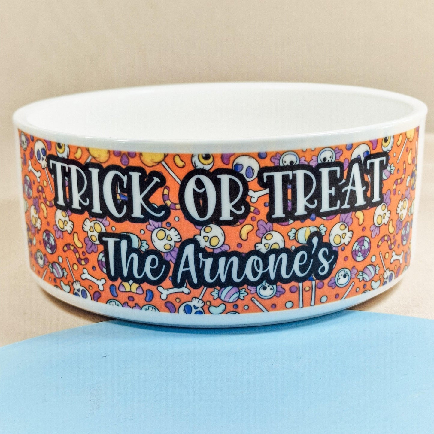 Personalised bowl for sweets with 'Trick or Treat' and a custom name. Available in small, medium, and large sizes. Ideal for Halloween, adding a festive touch to your celebrations.