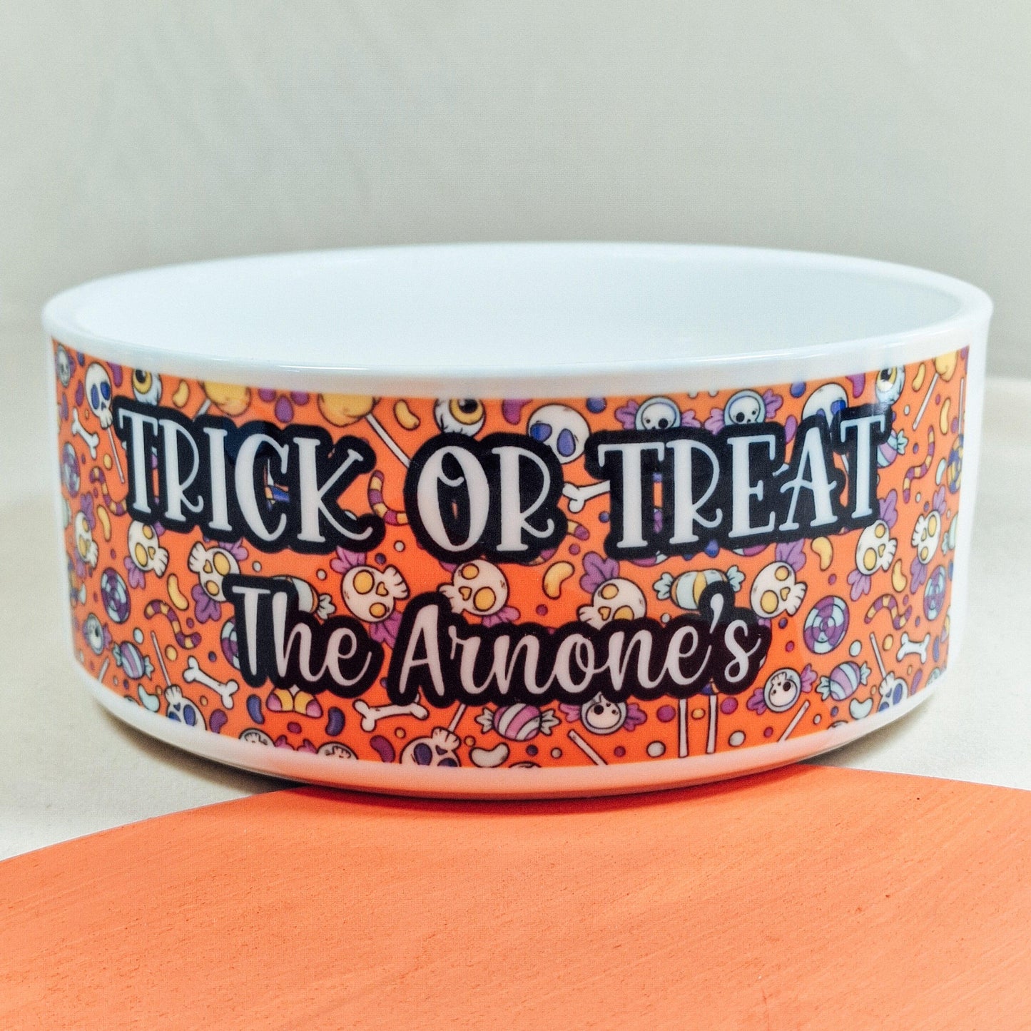 Personalised bowl for sweets with 'Trick or Treat' and a custom name. Available in small, medium, and large sizes. Ideal for Halloween, adding a festive touch to your celebrations.
