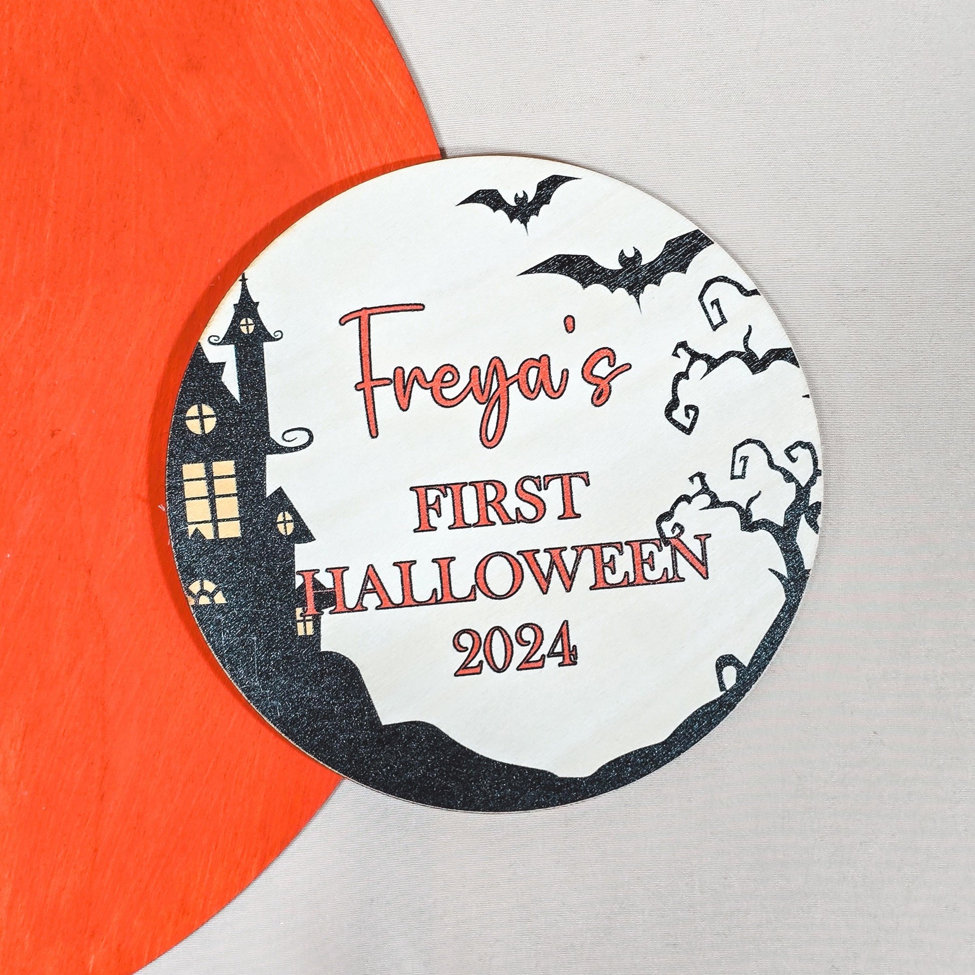 Personalised wooden sign for baby's first Halloween, featuring "Name's First Halloween [Year]" with a spooky design, perfect for nursery decor or Halloween celebration.






