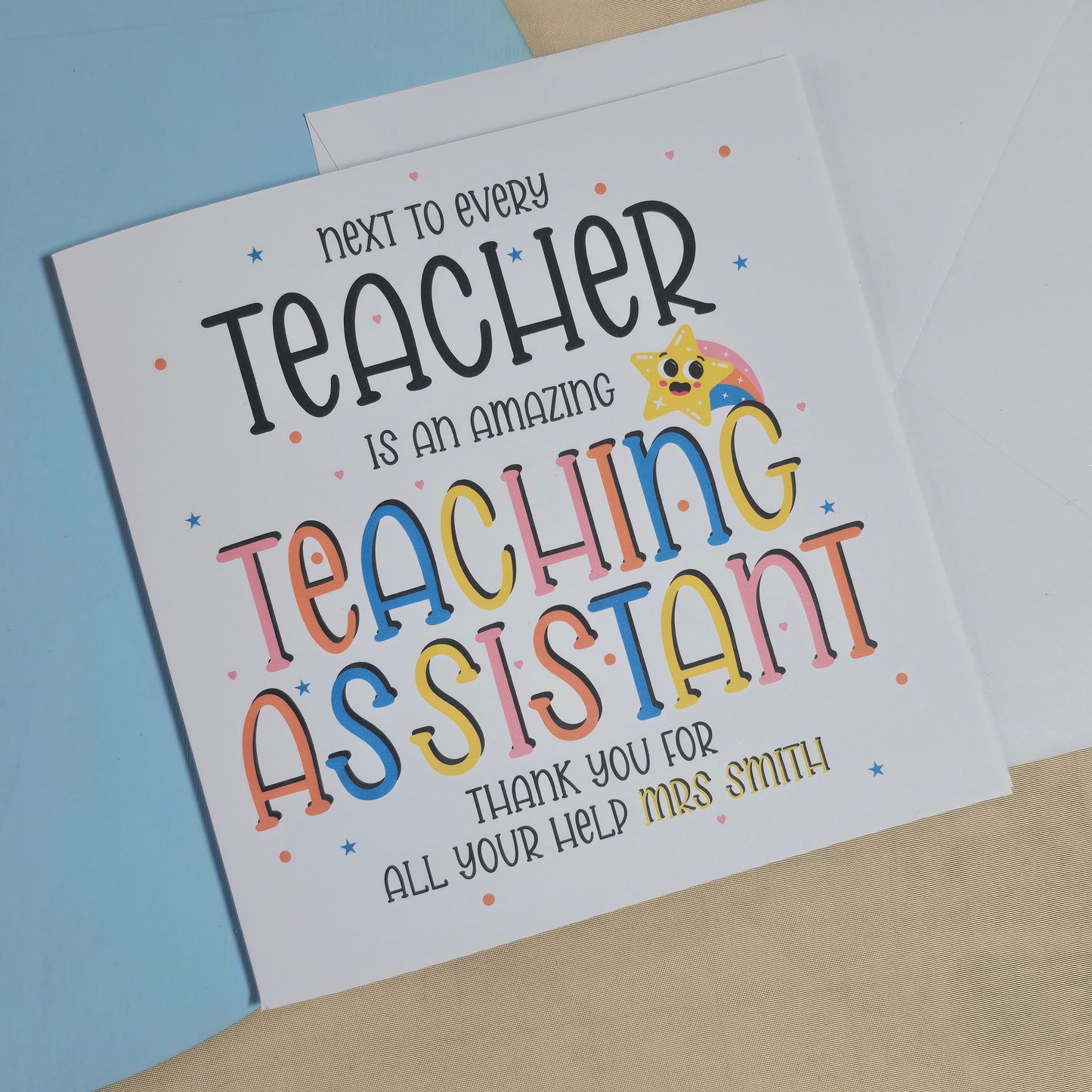 Square thank-you card with the message “Next to every teacher is an amazing teaching assistant – thank you [Name]” in playful fonts on a clean background.

