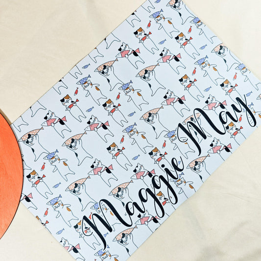 Colourful pet mat for cats featuring a vibrant design and personalised with the cat's name. Matching pet bowls available. Ideal for feeding or resting areas