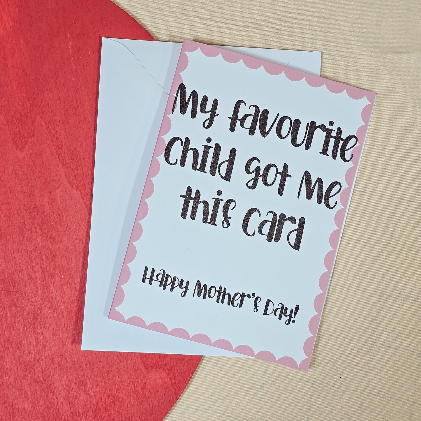 A6 Mother’s Day card with the text “My Favourite Child Got Me This Card. Happy Mother’s Day” in a playful font. Comes with a white envelope.
