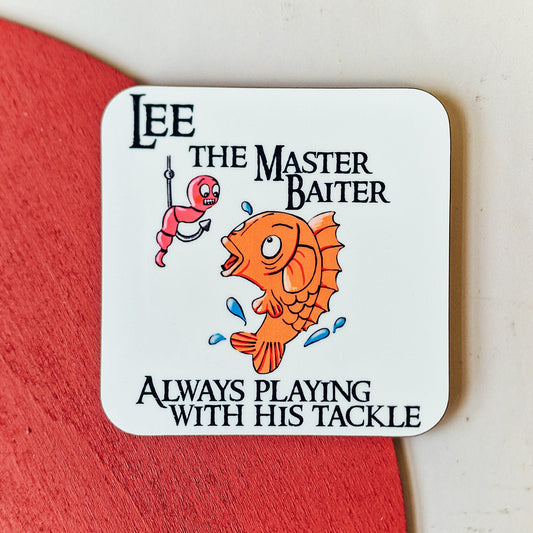 Coaster with the text "Name the Master Baiter, always playing with his tackle" featuring a fishing design, personalised with a name, ideal for anglers and fishing enthusiasts.