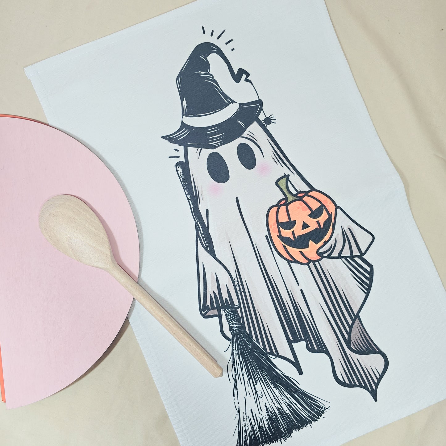Halloween-themed coloring page with a ghost holding a pumpkin on a white sheet of paper.