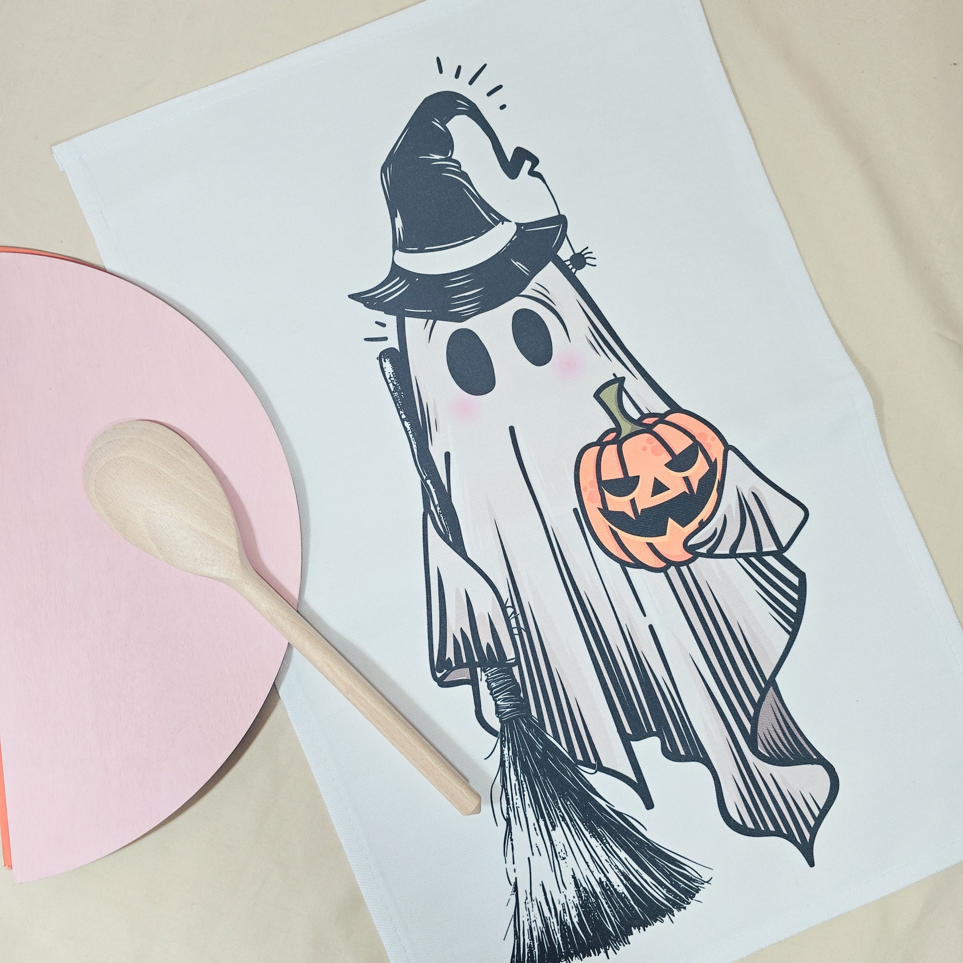Halloween-themed coloring page with a ghost holding a pumpkin on a white sheet of paper.
