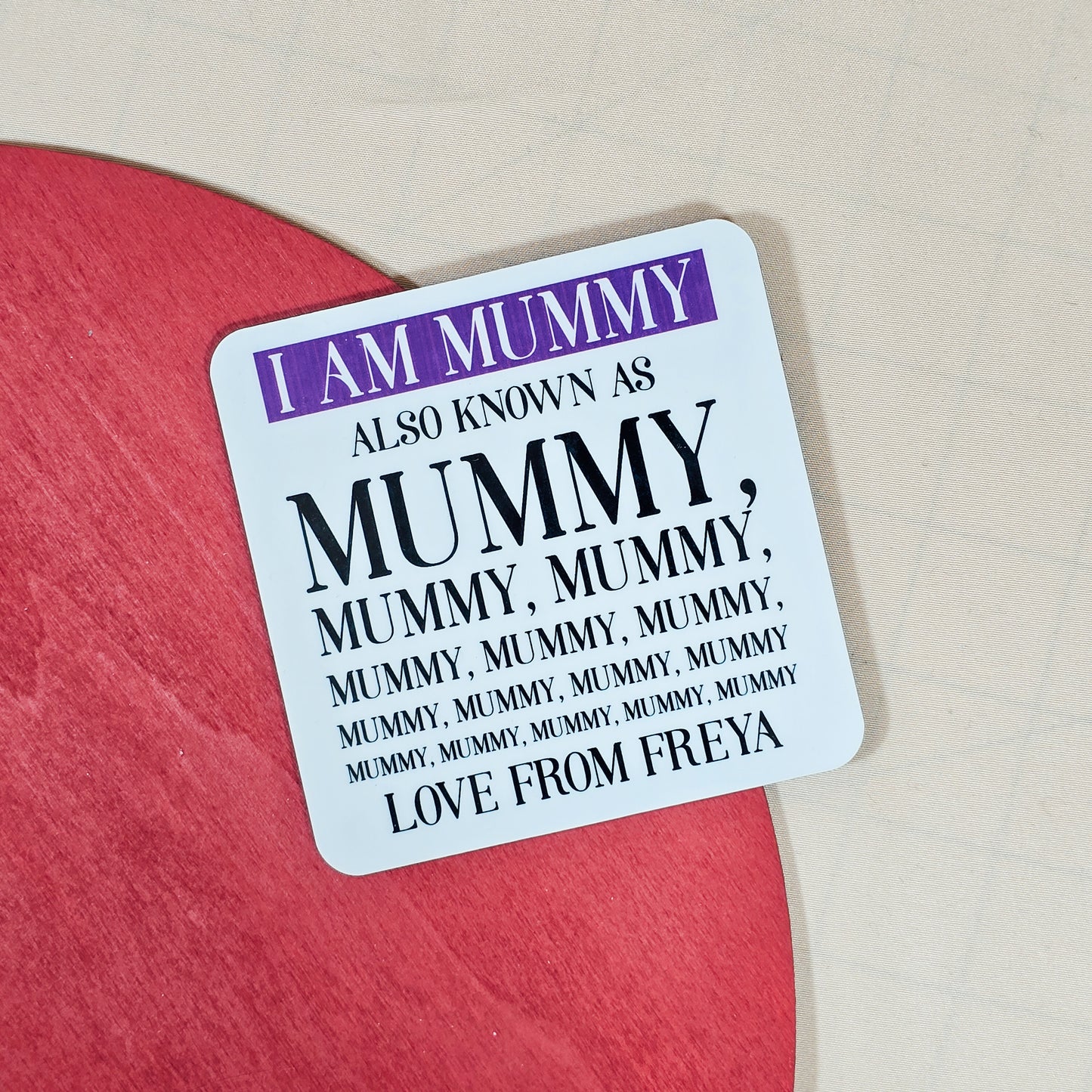 Funny personalised "I am mummy" coaster with repeated text and child's name.

