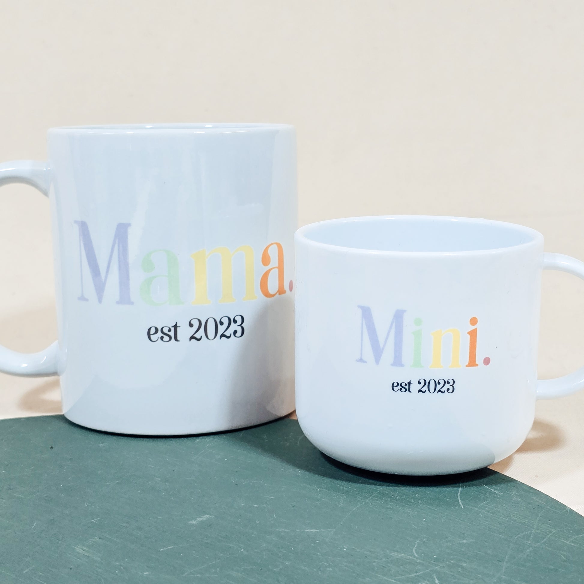 Matching Mama and Mini pastel mugs with personalised names and year, ceramic and polymer set

