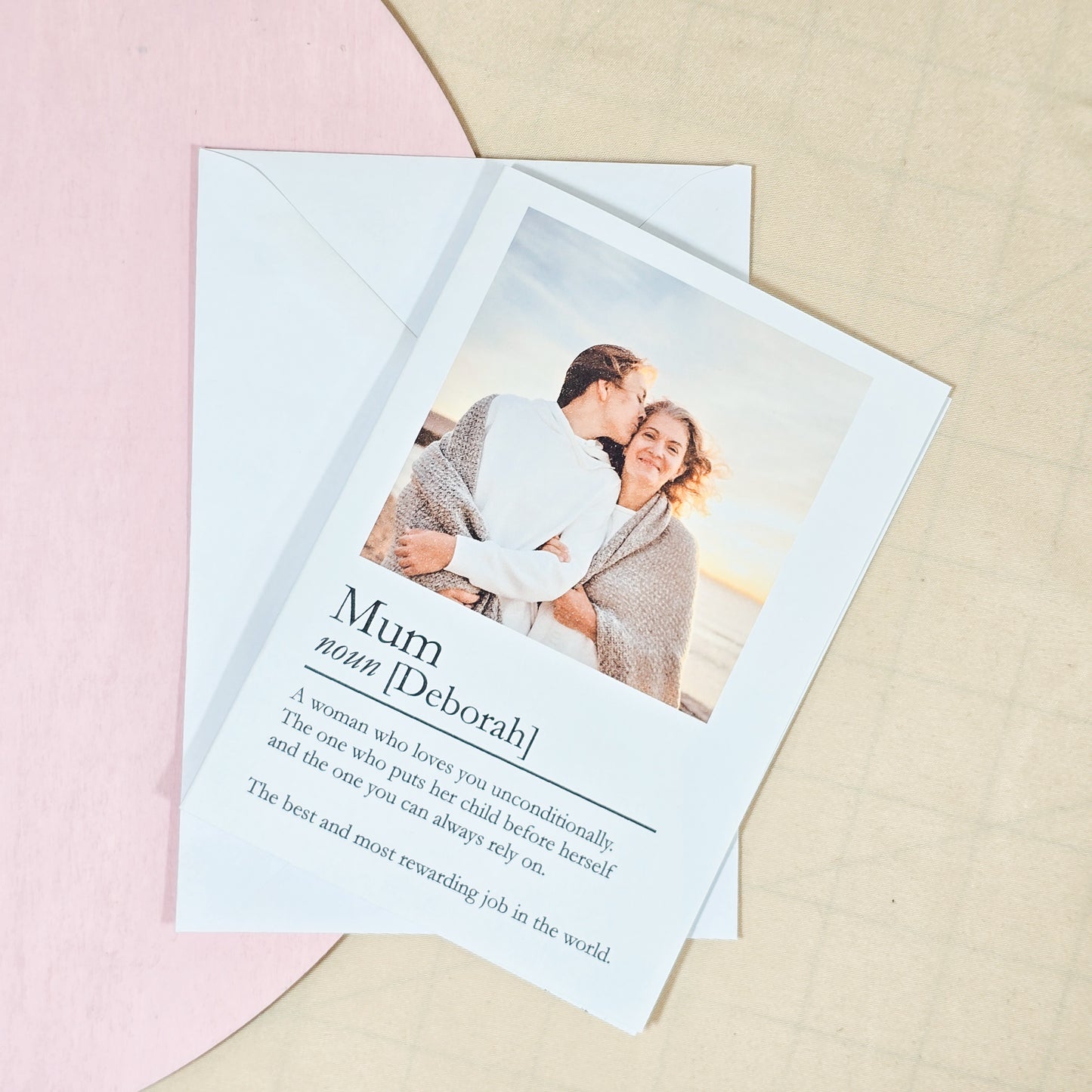 A6 greeting card featuring a personalised photo at the top, with "[Mum/Mummy/Mama] – Custom Definition" written below. Comes with a white envelope.







