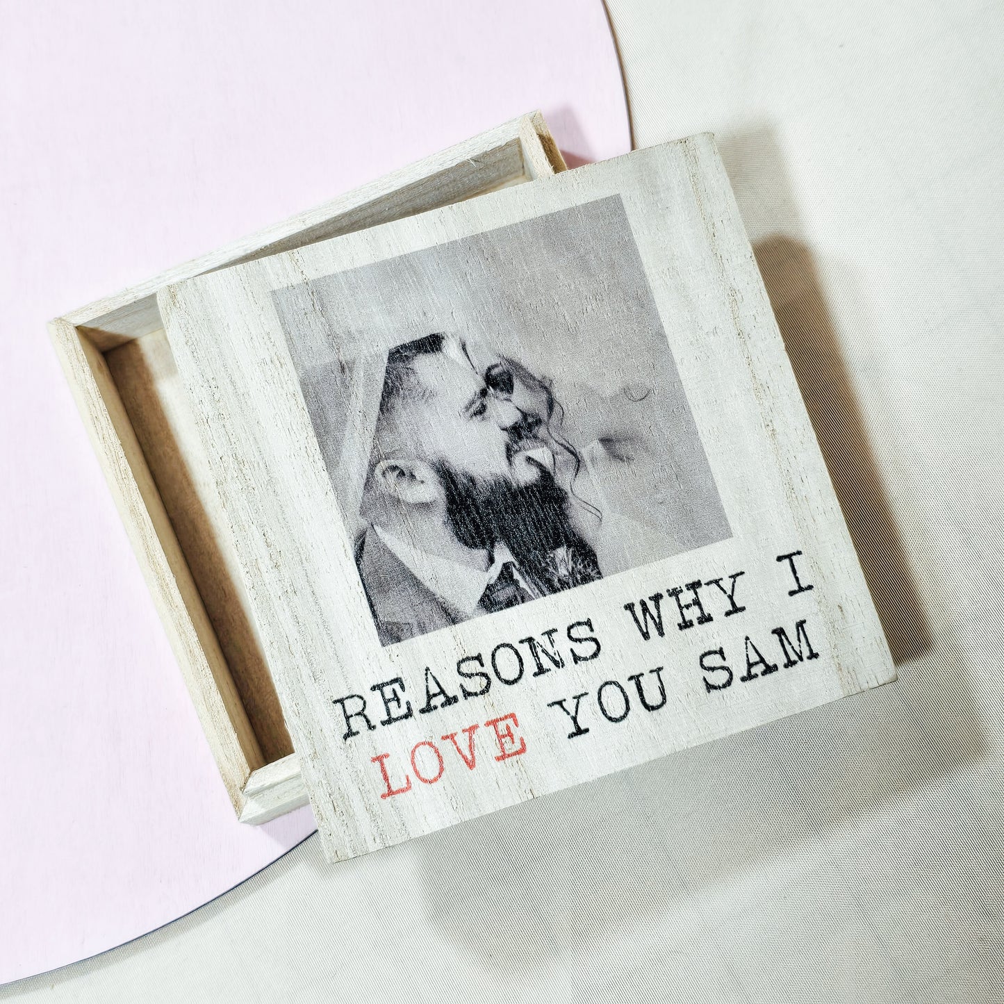 A small wooden box with a custom photo and the message "Reasons Why I Love You [Name]." Ideal for Valentine’s Day or anniversaries, ready to be filled with meaningful notes or trinkets.

