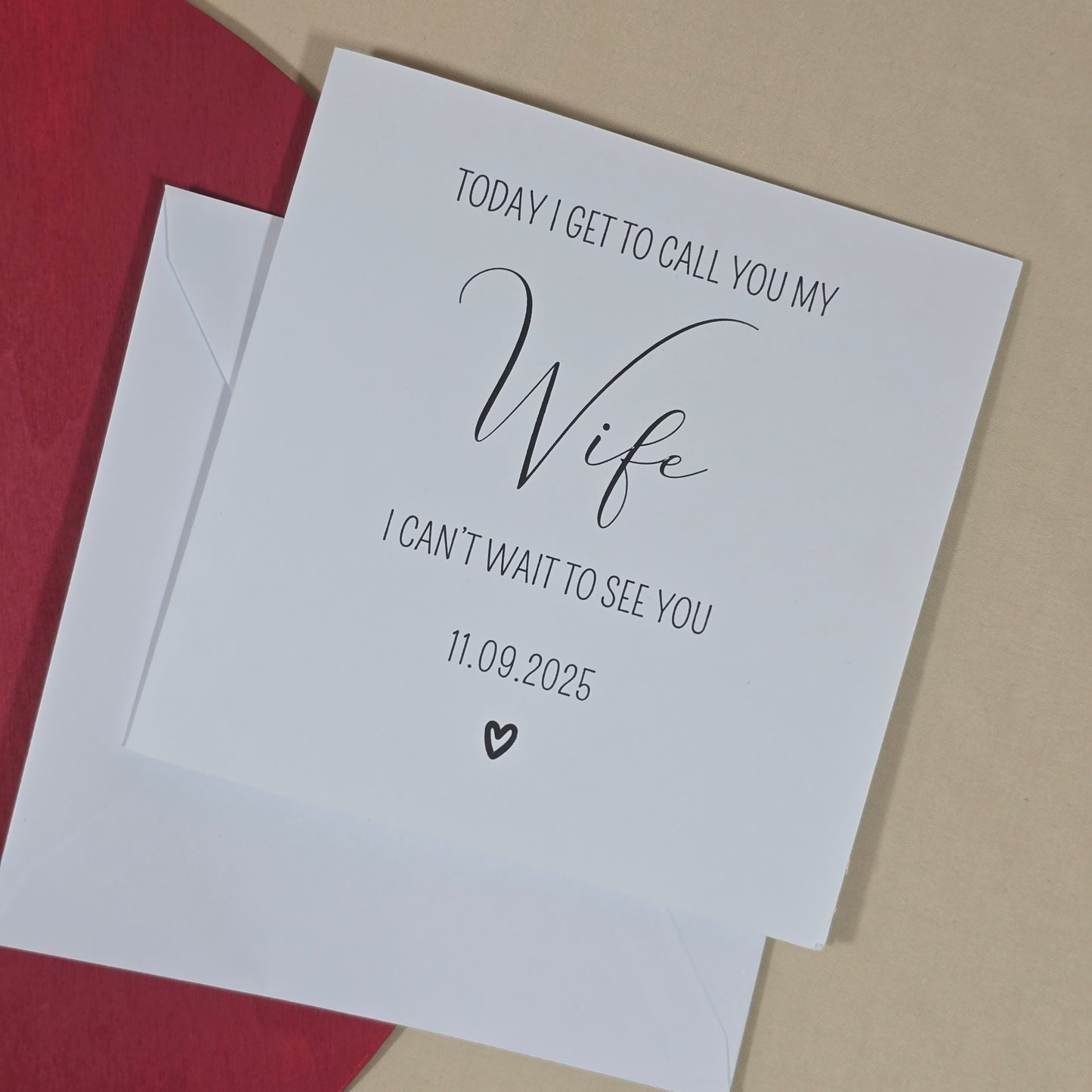 Card with text 'Today I get to call you my Wife. I can't wait to see you 11.09.2025' on a beige background.