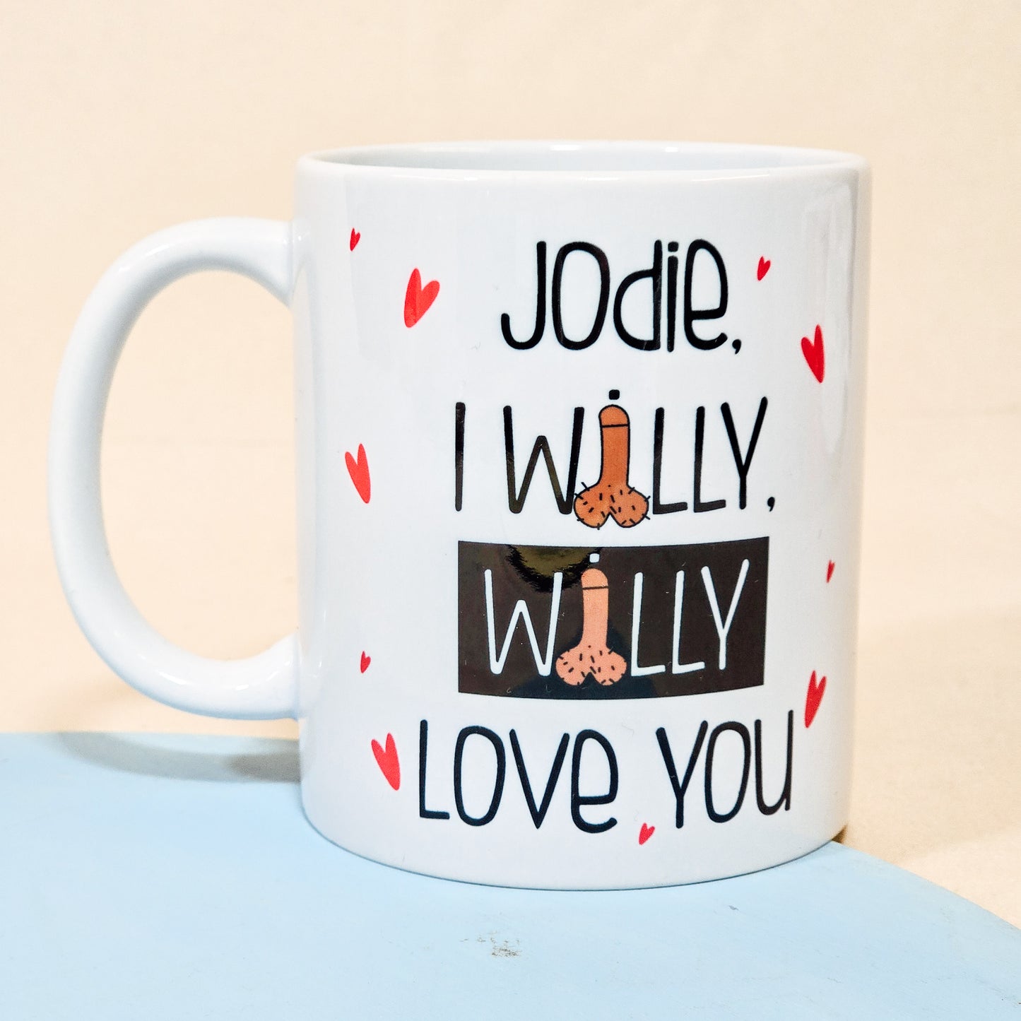 A white ceramic mug with the playful phrase "[Name], I Willy Willy Love You," perfect as a funny personalised Valentine's or anniversary gift.

